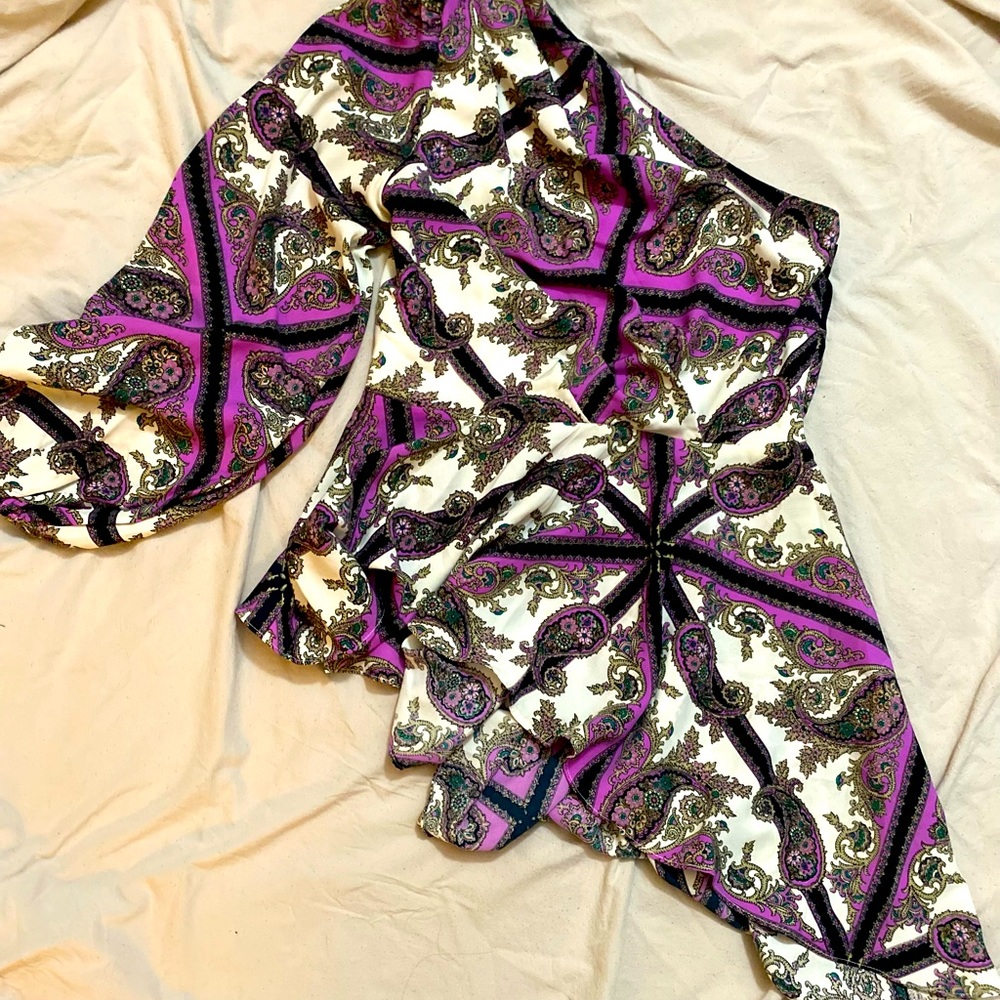 3/4/$20 Flirty fashion made fun in this boutique brand one shoulder top!!